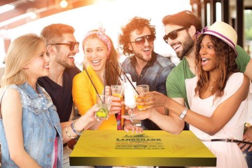 Group of people enjoying drinks at Landshark Bar and Grill at Resorts Casino Hotel in Atlantic City.