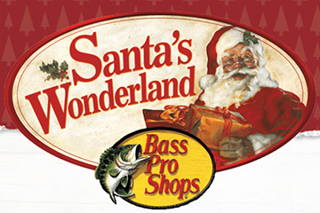 Santa's Wonderland Bass Pro Shops Santa holding gifts.
