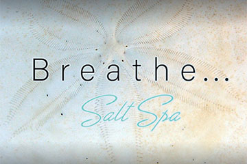 Breathe...salt spa with sand dollar in background.