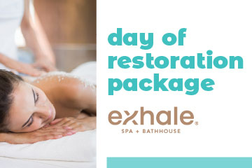 Day of Restoration Package Exhale Spa woman on massage table looking relaxed.