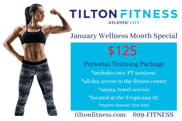 Tilton Fitness Atlantic City inside Tropicana with brick interior, fitness equipment, and mural of man running.