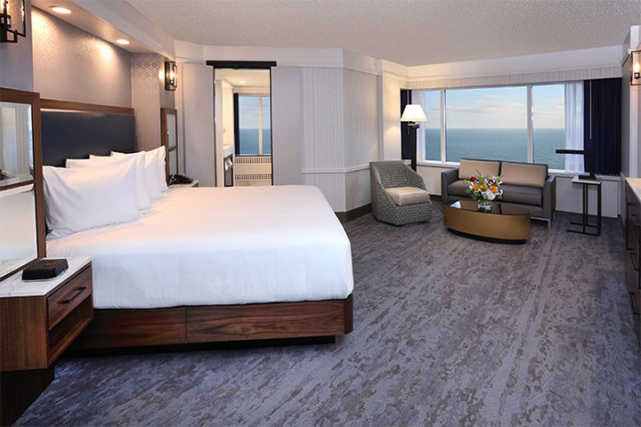 Bally's Atlantic City hotel suite with view of Atlantic Ocean.