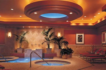 Spa Toccare at Borgata Hotel Casino and Spa. Hot tubs and lounge chairs in a tranquil setting.