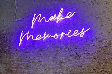 Make Memories - Neon against textured wall setting at Cardinal Restaurant in Atlantic City.