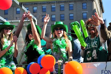 People participate in the St. Patrick's Day parade on the Atlantic City Boardwalk.