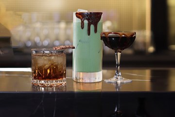 Ocean Casino Resort - 3 different Girl Scout Cookie Cocktails garnished with dripping with chocolate and cookie.